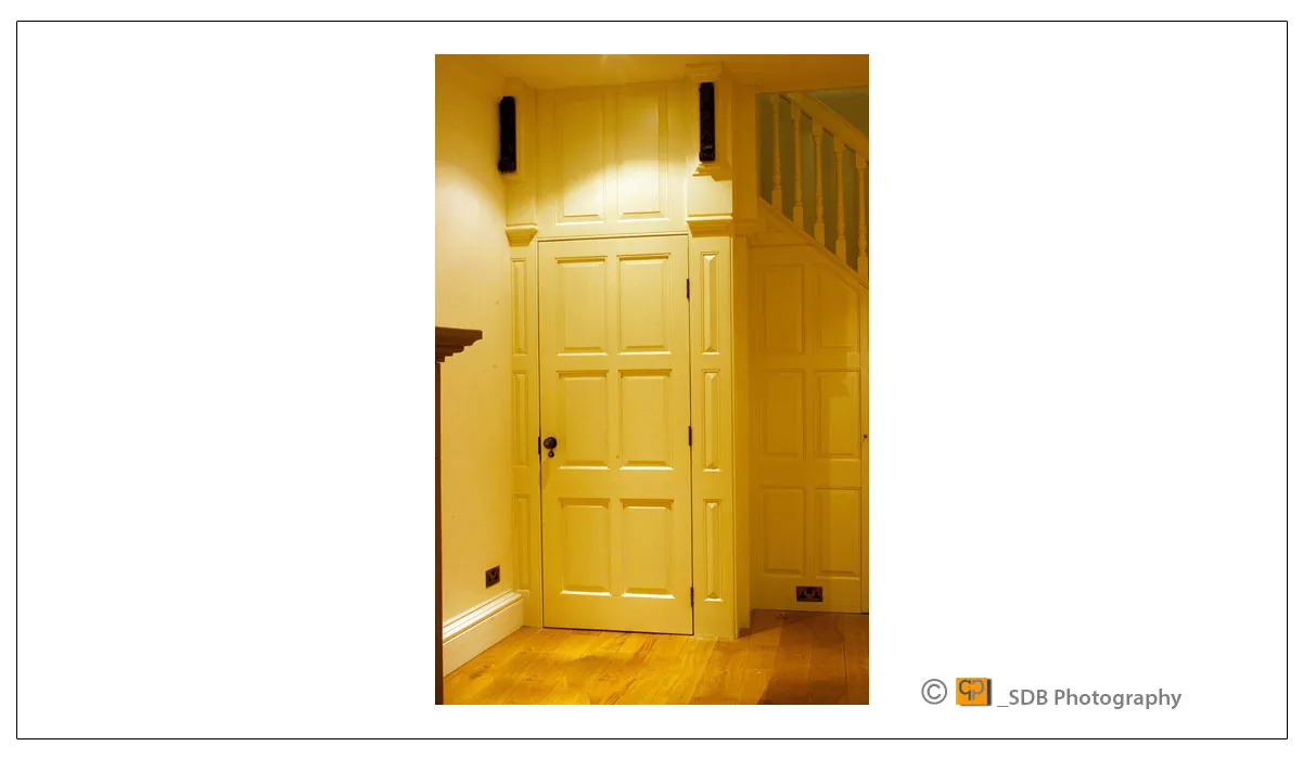 Under stair doors with antique oak corbels